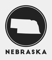 Nebraska icon. Round logo with us state map and title. Stylish Nebraska badge with map. Vector illustration.