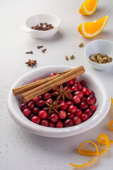 Bakery background with ingredients for cooking Christmas baking. Flour, brown sugar, cranberry and spices top view