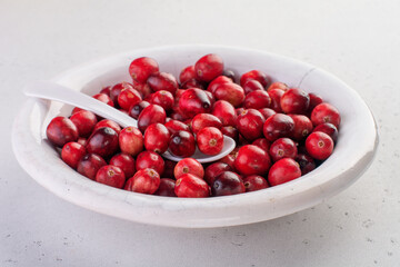 Bakery background with ingredients for cooking Christmas baking. Flour, brown sugar, cranberry and spices top view