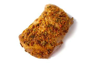 Appetizing baked meat with black pepper isolated on white background close-up