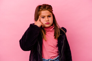 Little caucasian girl isolated on pink background