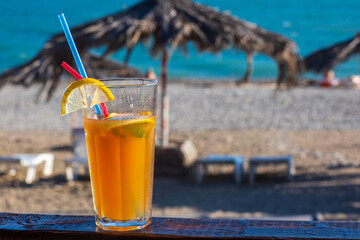 cocktail on the background of the sea and the beach