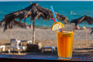 cocktail on the background of the sea and the beach
