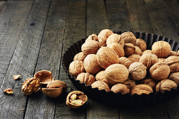 Walnuts on a wooden table.