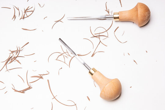 Linocut Tools With Linoleum Pieces On Table After Cuting Brown Linoleum