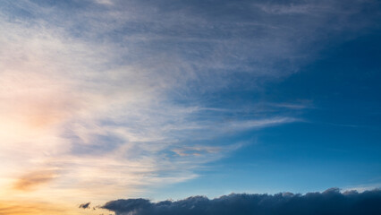 Naklejka na ściany i meble Beautiful bright sunset sky with clouds Nature sky background.