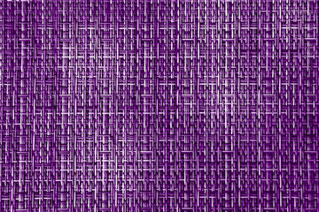 Texture of a wicker plastic purple surface. White-purple background for design