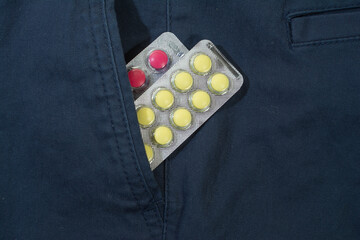 pills in a blister pack in the cpocket