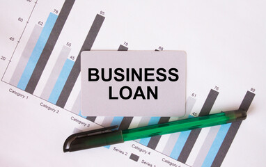 Business card with text Business Loan. Diagram and green pen