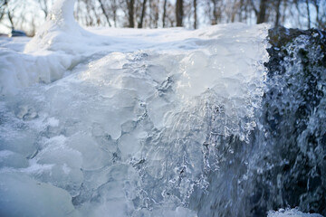 Fototapeta na wymiar Frozen waterfall. Waterfall in winter. frozen water ice texture.