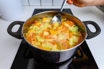 Cooking Bright Vegetable Soup on the Stove