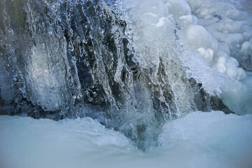 Frozen waterfall. Waterfall in winter. frozen water ice texture.