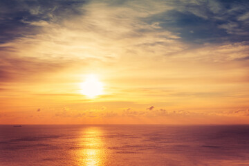 Bright beautiful sunrise or sunset at sea