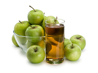 Apple juice and fruits of green apples in glassware