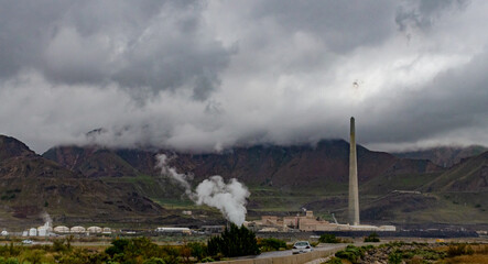 Fototapeta premium Oil refinery and a factory for obtaining silver on the shore
