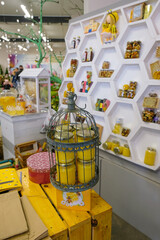 Shop window with honey products In Lutsk Ukraine, during the spring fair. Small business support. Vertical image. 