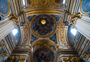 inside a catholic church with beautiful architecture and paintings italy