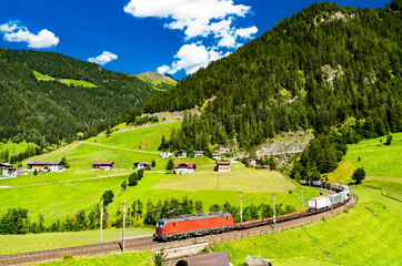 Trucks crossing the Alps by rail at the Brenner Pass in Austria