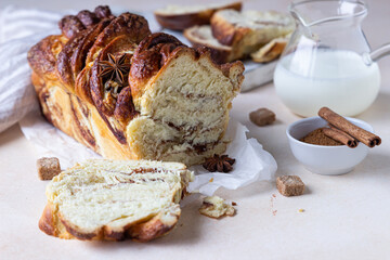 Babka or brioche bread with cinnamon and brown sugar. Homemade pastry for breakfast.