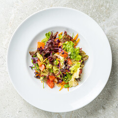 fresh salad with salmon and vegetables