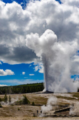 Geyser Old Faithful erupts in Yellowstone National Park in Wyoming, US