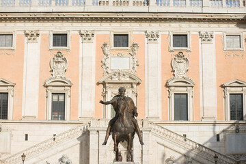 Monument of architecture sculptures of a lion, a wolf, an elephant and birds, ancient rome, their...