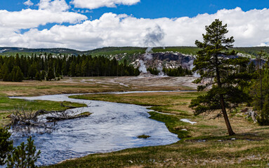 Fototapeta na wymiar River with warm water in the valley of the Yellowstone NP, USA