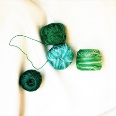 green embroidery thread skeins