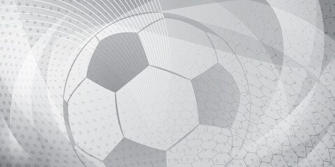 Football or soccer background with big ball in gray colors © Olga Moonlight