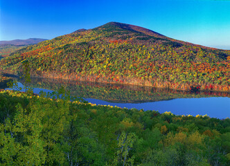 Landscape of Traveler Mountain and South Branch Pond, fall foliage, Baxter State Park, Maine, USA.