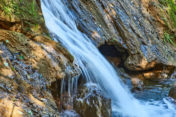 Cuba. Trinidad. Reserve Topes de Collantes. A small waterfall in Guanayar Park