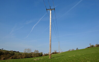 Fototapeta na wymiar power lines in the field