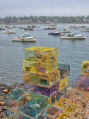 USA, Maine. Colorful lobster pots on a dock in the Bernard fishing village, Mount Desert Island,...
