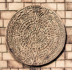 Ceramic tiles in the form of traditional Mayan designs. Calendar and predictions