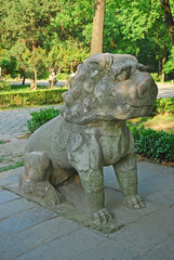 China, Nanjing, stone lion in the Sacred Way to Xiao ling Mausoleum. The place has harmony and serenity atmosphere. - 419257250