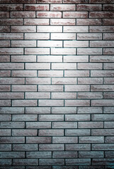 Empty space of brick wall texture background with spotlight. brick wall. Light on the wall. Brick dark background.
