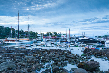 USA, Maine, Camden. Camden Harbor with schooners at dawn.