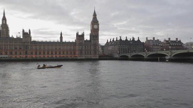 Fast Rib Boat Pass Houses of Parliament and Big Ben London