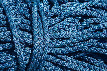 Close-up of a blue rope. A coil of blue ropes.