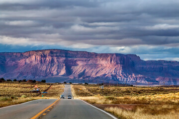 spectacular landscape photo of buttes and mesas in Monument Valley in the border of Utah and Arizona.
