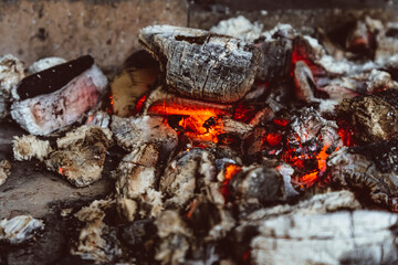 hot red coals in the oven barbecue heat smoulders