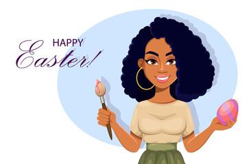 Happy Easter. African American woman painting egg