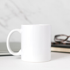 White Mug with copy space on front in lifestyle setting