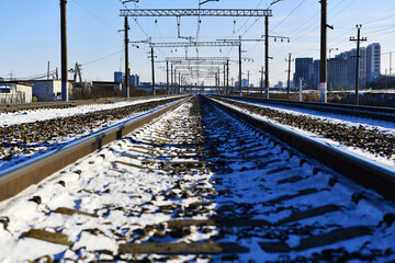 The steel track goes beyond the horizon. Railroad perspective. High-speed metal line for high-speed...