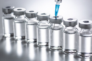 syringe and vaccine bottle