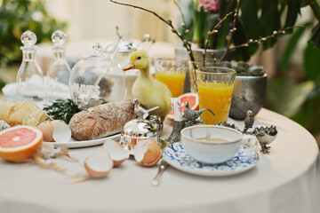 beautiful and cozy bright easter table decoration