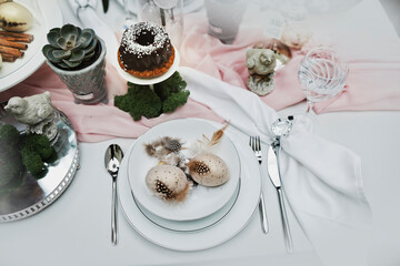 beautiful and cozy bright easter table decoration