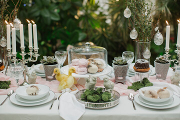 beautiful and cozy bright easter table decoration