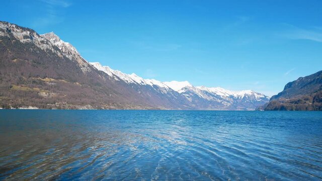 Breathtaking view of the Lake Brienz. Turquoise calm water, majectic alps