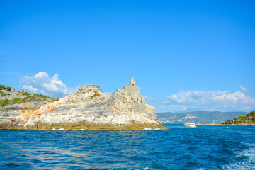 The gothic Church of St Peter and Doria Castle on the rocky peninsula at the entrance to the gulf...